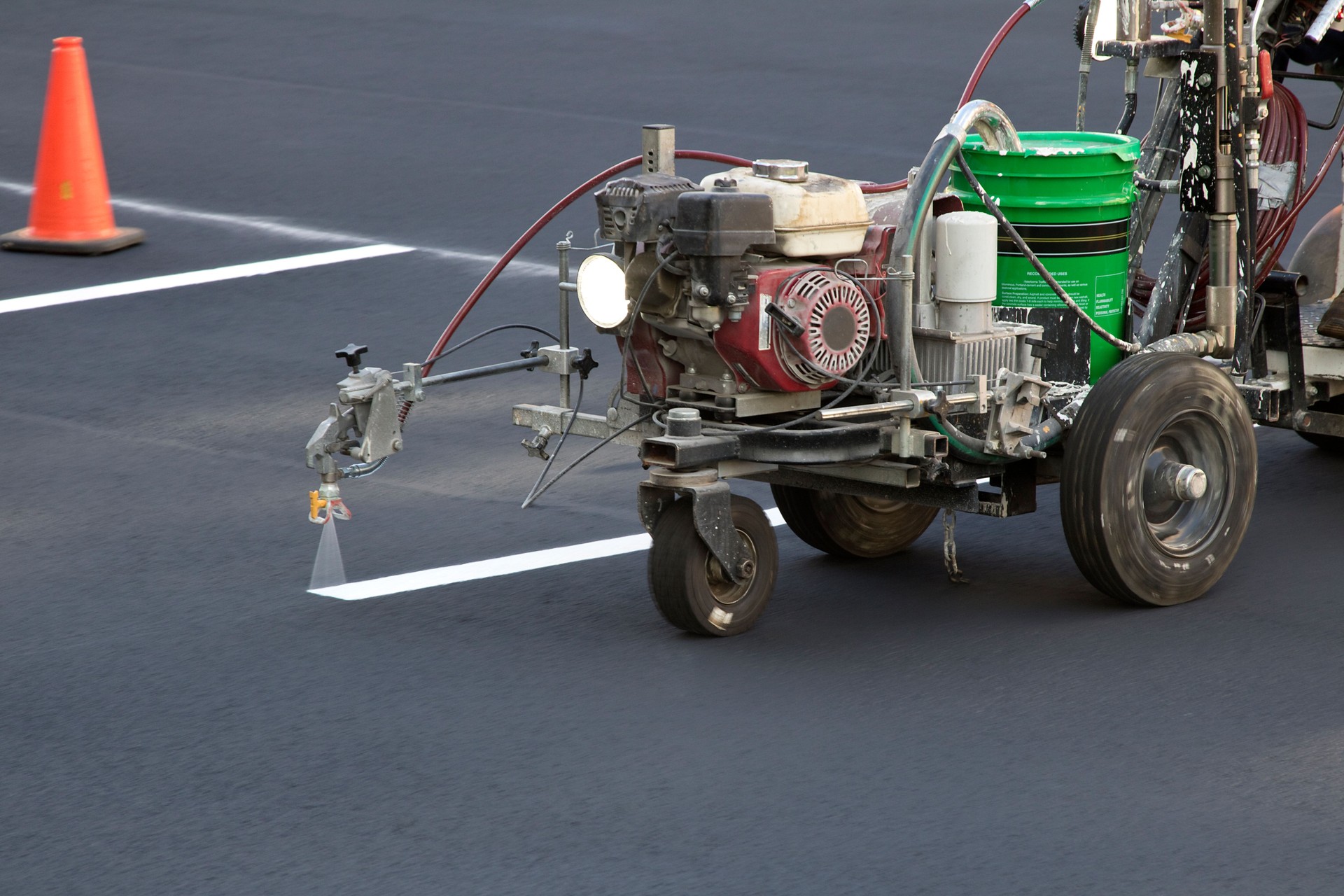 Marking machine painting parking lot lines